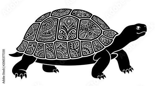 Black turtle with ornate shell design.