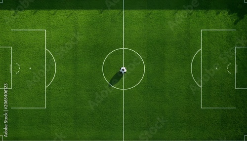 Top view soccer football field template with a classic ball on the center circle line flat tactical layout of green grass pitch stadium markings and goals overhead digital illustration background