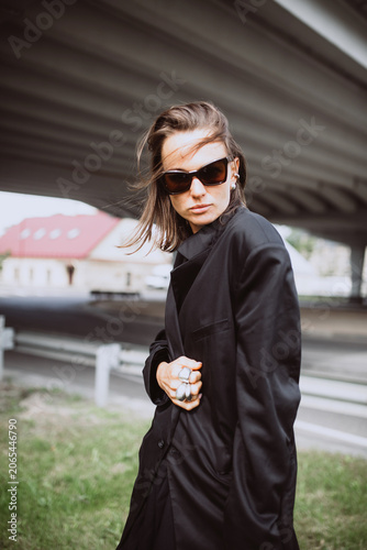 Fashion street portrait of a modern emotional woman
