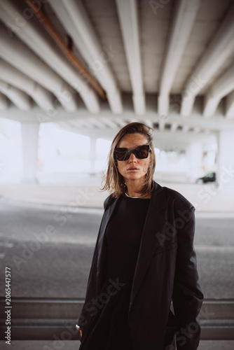 Fashion street portrait of a modern emotional woman
