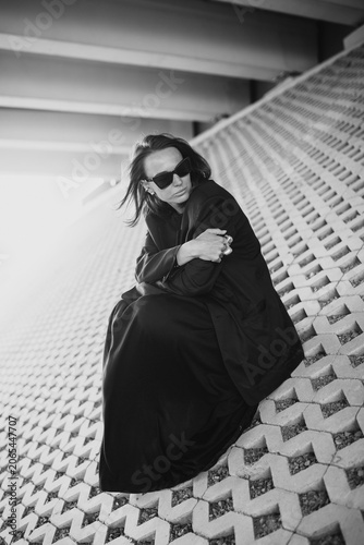 Fashion street portrait of a modern emotional woman