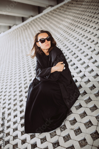 Fashion street portrait of a modern emotional woman