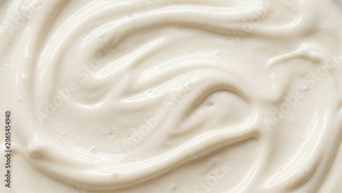 Macro Close-Up of Smooth White Cream Swirl Texture — Greek Yogurt, Sour Cream or Cosmetic Lotion Abstract Background