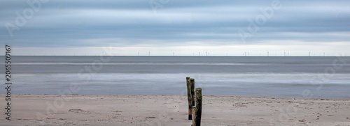 Long exposure seascape with offshore wind farm in Denmark