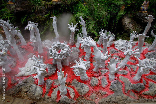Φωτογραφία Ethereal white hands rise from vibrant red soil creating a dreamlike atmosphere