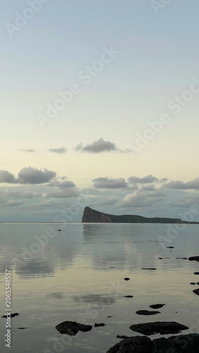 Bild auf Leinwand Scenic Coastal View of Coin de Mire Island at Twilight Mauritius
