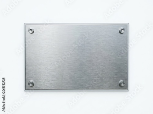 A blank metal plaque with four screws, ready for engraving, set against a white background
