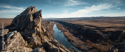 High vantage point revealing a sharp rocky formation and creek