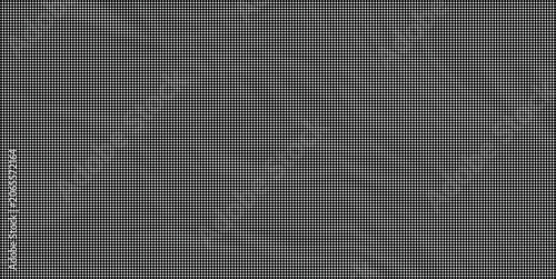 A close-up shot of a crumpled gray fabric showing its textured surface and wrinkles in a studio.