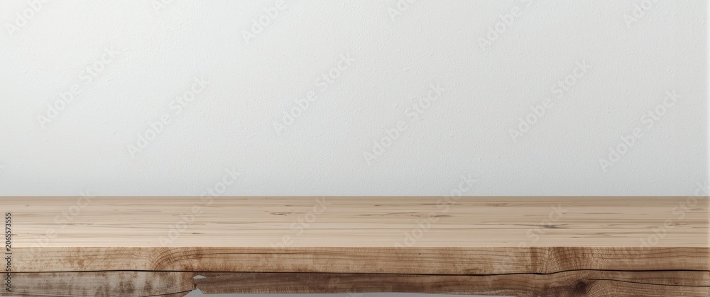 Fototapeta premium Wooden tabletop against a plain white wall