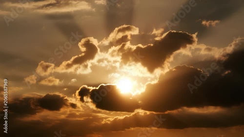 Sunset Sky with Golden Sun Rays Breaking through Dark Clouds Nature Landscape Photography for Calming and Peaceful Concepts