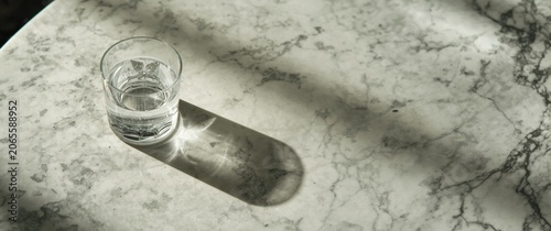 Single glass of water on te...