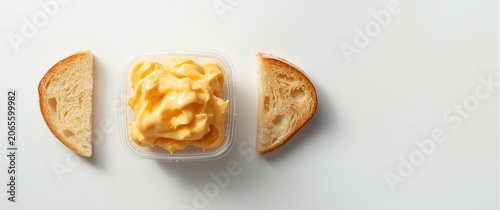 Plastic tub holding creamy ...