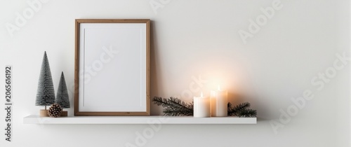 Blank frame and candles on ...