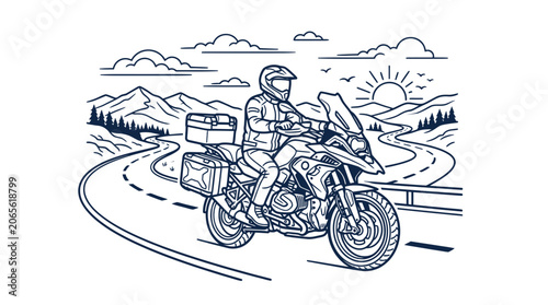 Motorcyclist on adventure touring bike riding scenic mountain road