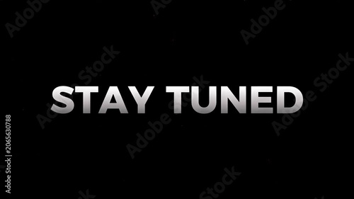 A dynamic visual prompt encouraging viewers to remain attentive and anticipate forthcoming content or updates, crafted with bold typography on a stark background