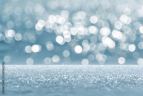 Blurred blue teal water background bokeh lights for moisturizing skincare, spa wellness. Sea blur backdrop surface glare shine. Sparkle skincare layout for summer product text marketing, luxury spa ad