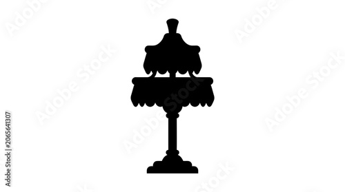 Silhouette of ornate decorative lamp stand.