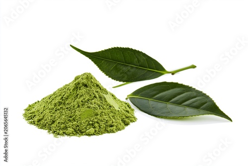 Green tea powder and fresh leaves on a white background showing the natural form of green tea used for drinks and cooking