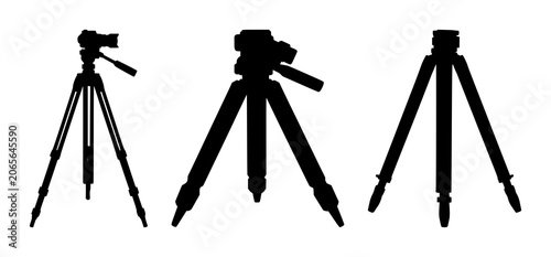 Tripod set with black silhouette against white background featuring photography, studio gear, camera support with tripod and lens