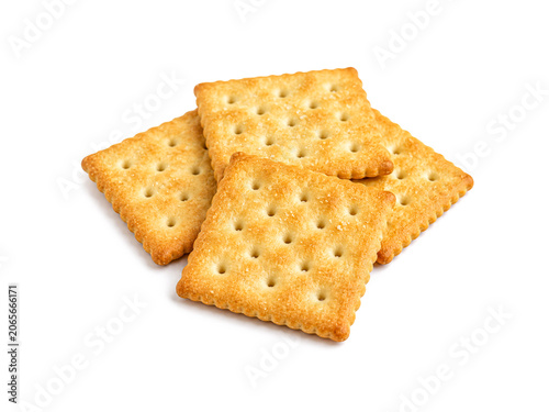 Foto Crispy square crackers biscuits isolated on white background
