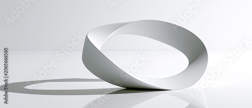 Fototapeta A continuous, one-sided Mobius strip forms a loop against a white background