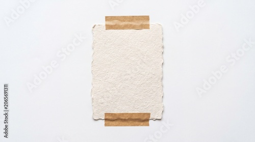 Blank handmade paper sheet with tape