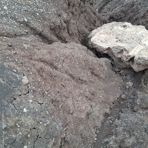 Obraz na plátne Dark gray hardpan soil is often waterlogged and has poor drainage