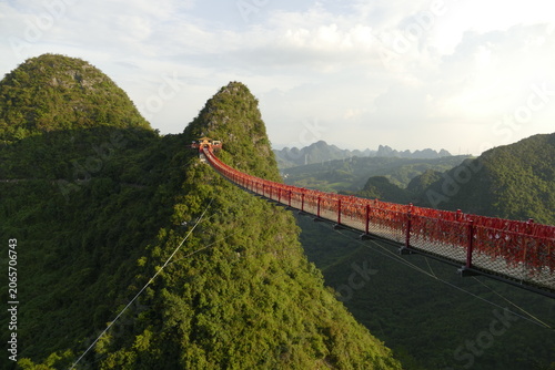 Ruyi Peak Cableway Scenic Area over Yangshuo's Karst peaks in China.
Best travel idea is to capture the poetic essence of Guilin's landscapes from here
