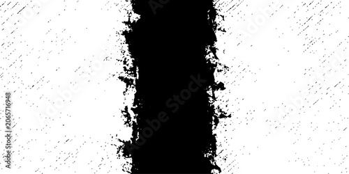 A stark black line with a rough, textured edge cuts vertically through a white background, creating a powerful graphic contrast and a sense of separation or division.