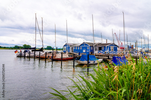 Harbor in Arnis with piers, sailing yachts and typical architecture along the shore of the Schlei