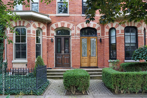 Photography Victorian townhouses with polychromatic brick design, common in downtown Toronto