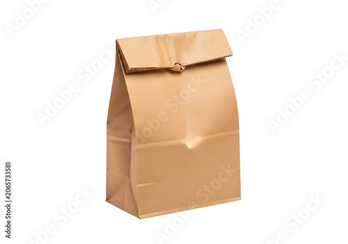 Brown paper lunch bag isolated on transparent background, simple reusable packaging for food, groceries and takeout meals, folded top, modern design.
