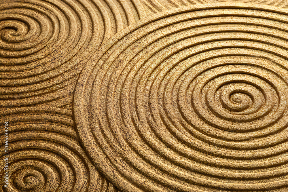 Fototapeta premium Abstract golden background with concentric circles, spiral pattern, textured surface, metallic finish, luxury design, closeup view of circular ripples in gold material