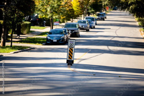 Obraz na płótnie Speed Enforcement Warning Sign on a Quiet Residential Toronto Street