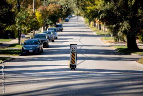 Fotografie Speed Enforcement Warning Sign on a Quiet Residential Toronto Street