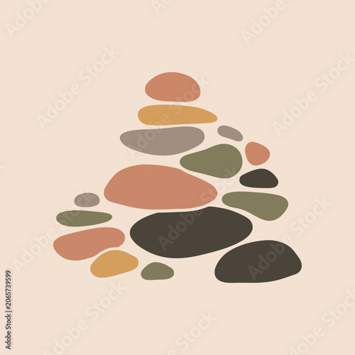 Canvas Print A stack of smooth colorful stones on a light neutral background