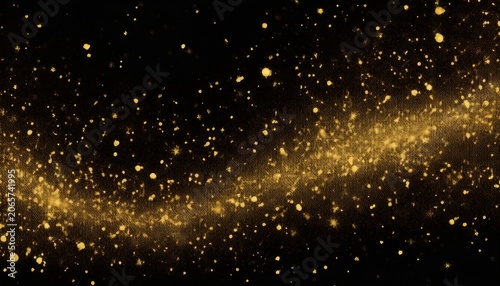 shimmering gold flakes sparkling gold particles on a black background tiny material for backgrounds or textures in art designs