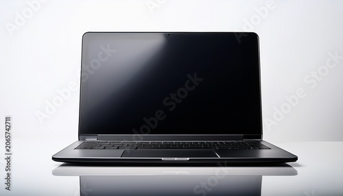 studio shot of a black laptop shot on white