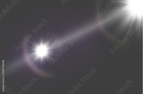 Bright double lens flare overlay with diagonal light beam on dark background
