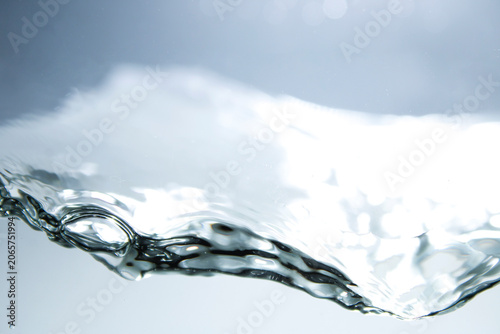 Clear Water Surface with Gentle Ripples and Light Reflections
