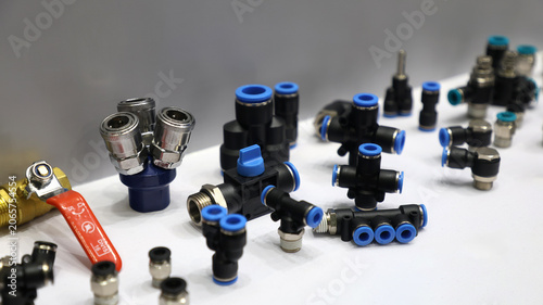 Various types of pneumatic fittings and connectors and valves