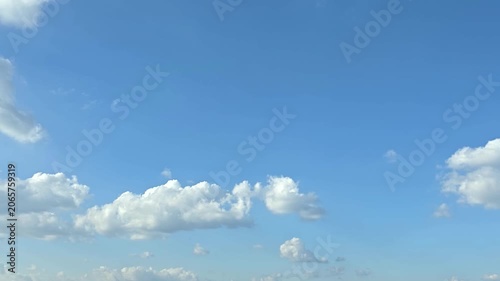 Cloudscape, Timelapse of Blue Sky with Fluffy White Cumulus Clouds along Horizon for Background and Banner Design