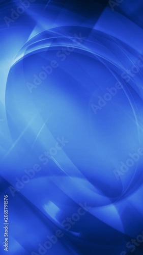 Vertical Blue Rings Around Reality Background 4K Loop features Rings of light blue twirling and swirling on a darker blue background in a vertical ratio loop.