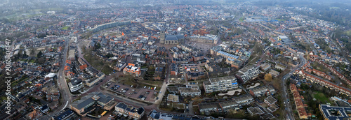 Aerial view beside the old town above the city Oldenzaal in the netherlands, on a sunny afternoon in autumn.