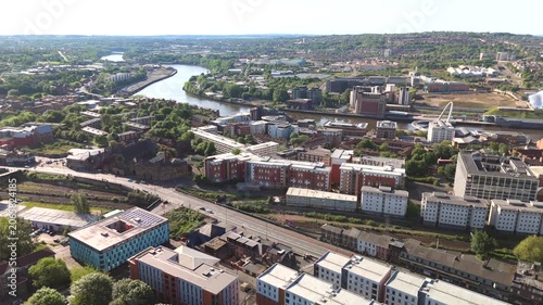 Newcastle Upon Tyne UK: 25th May 2026: Drone footage of Manors and Byker showing residential buildings and green spaces during a sunny day. With the River Tyne and Byker bridge