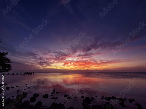 Принти на полотні A beautiful sunset over the calm waters of Biscayne Bay, taken from Elliott Key