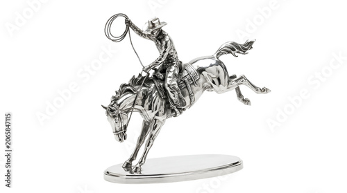 A detailed silver metallic sculpture of a cowboy riding a bucking horse, captured on a white background, representing western rodeo culture