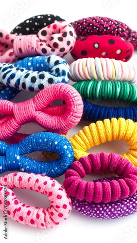 Colorful knitted wool balls in pastel shades.