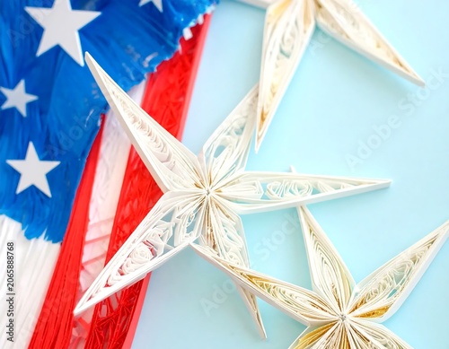 American flag waving against clear sky background.